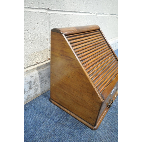 1302 - AN EARLY 20TH CENTURY MAHOGANY STATIONARY CABINET, with a tambour door, that's enclosing a fitted in... 