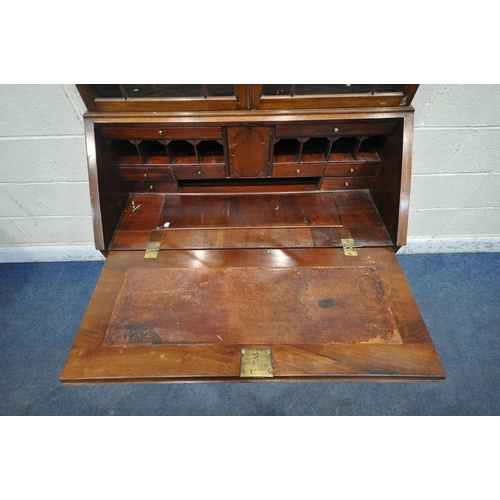 1303 - A GEORGIAN MAHOGANY BUREAU BOOKCASE, the double glazed doors enclosing two shelves, atop a base with... 