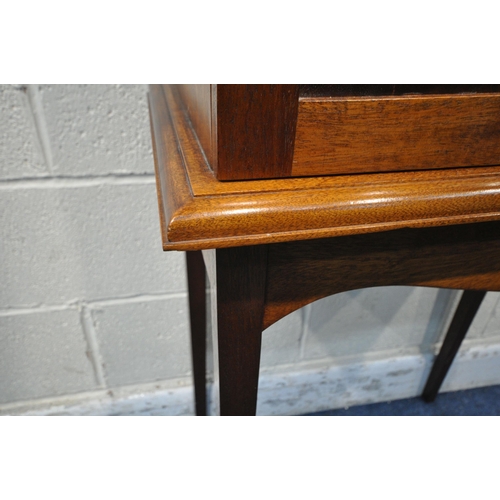 1304 - A 20TH CENTURY MAHOGANY CABINET ON STAND, with double glazed doors, raised on square tapered legs, w... 