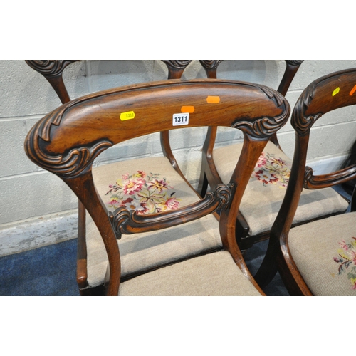 1311 - A SET OF FOUR VICTORIAN ROSEWOOD CHAIRS, with scrolled details to the backrest, beige and floral dro... 