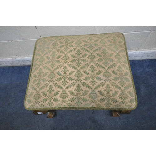 1334 - AN EARLY 20TH CENTURY RECTANGULAR STOOL, raised on cabriole legs, with ball and claw feet, width 67c... 