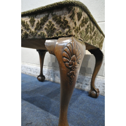 1334 - AN EARLY 20TH CENTURY RECTANGULAR STOOL, raised on cabriole legs, with ball and claw feet, width 67c... 