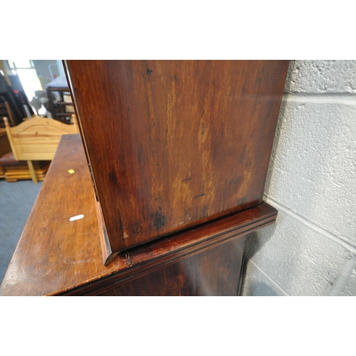 1335 - A 19TH CENTURY MAHOGANY BOOKCASE, with double glazed doors, atop a base with a single drawer and dou... 