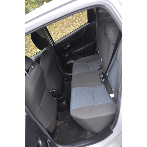 1002 - A 2012 TOTOYA YARIS TR-VVT-1 FIVE DOOR HATCHBACK CAR IN SILVER with a 1329cc petrol engine, 6 speed ... 