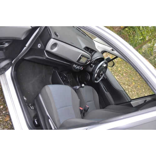 1002 - A 2012 TOTOYA YARIS TR-VVT-1 FIVE DOOR HATCHBACK CAR IN SILVER with a 1329cc petrol engine, 6 speed ... 