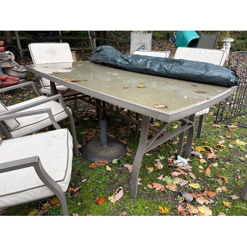 1006 - A MODERN METAL AND GLASS BELLAGIO GARDEN TABLE, width 100cm length 186cm, and six matching chairs, w... 