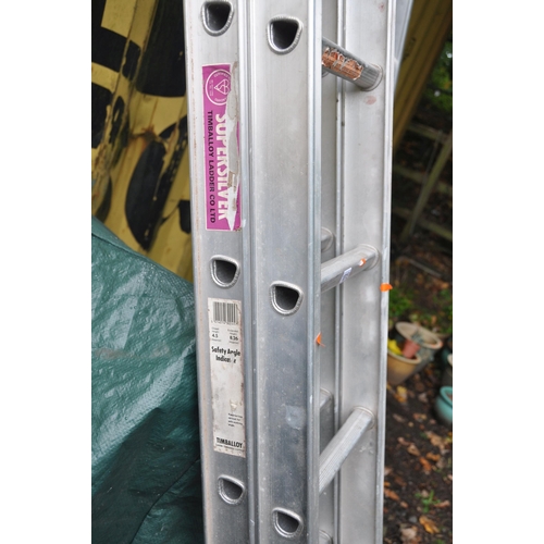 1015 - AN ALUMINIUM DOUBLE EXTENSION LADDER with sixteen rungs to each 450cm length