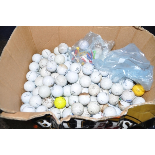 1062 - A BOX CONTAINING NEW AND USED GOLF BALLS including a sealed box of Spalding Molitor power pack of 15... 