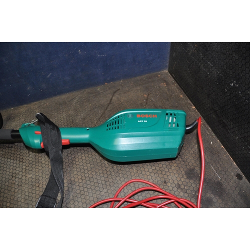 1070 - A BOSCH ART35 ELECTRIC STRIMMER total length 167cm (PAT pass and working)