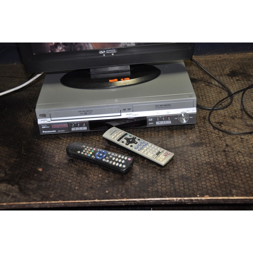 1077 - AN ACOUSTIC SOLUTION LCDW19HDF 19in TV WITH REMOTE and a Panasonic DVD/video player with remote (vid... 