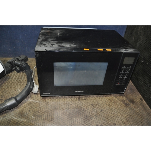 1085 - A PANASONIC CONVECTION MICROWAVE and a Goblin vacuum cleaner (no metal pipe for floor head)(both PAT... 