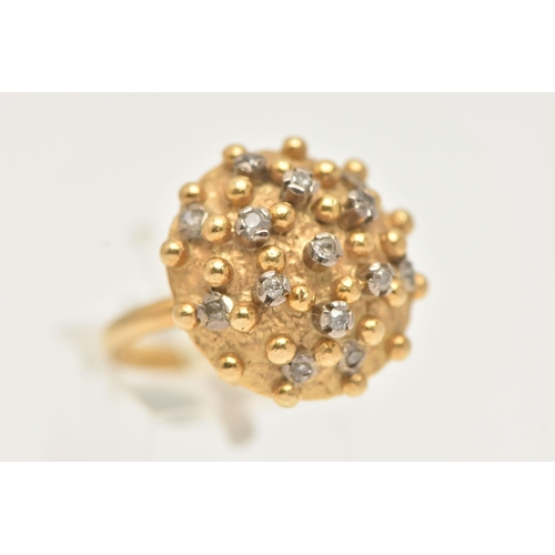 1 - A YELLOW METAL AND DIAMOND BOMBE RING, designed as a raised circular hollow dome with beading detail... 