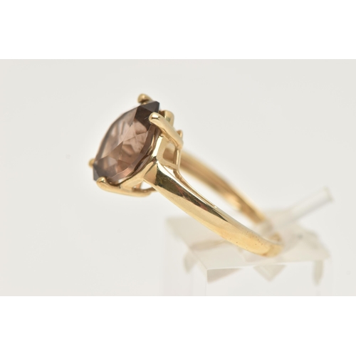 11 - A 9CT GOLD SMOKY QUARTZ RING, a single fancy cut stone, prong set in yellow gold, hallmarked 9ct Bir... 