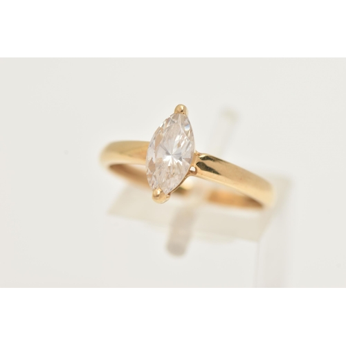 12 - AN 18CT GOLD SINGLE STONE RING, a marquise cut colourless cubic zirconia, prong set in yellow gold, ... 