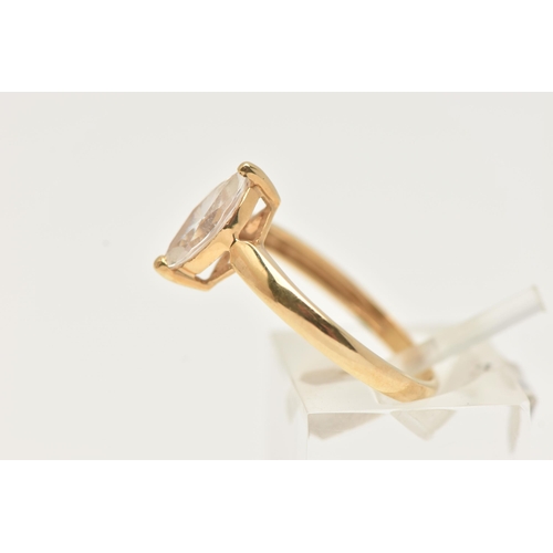 12 - AN 18CT GOLD SINGLE STONE RING, a marquise cut colourless cubic zirconia, prong set in yellow gold, ... 