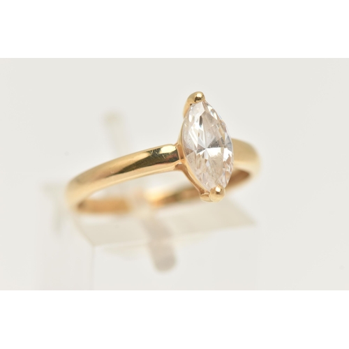 12 - AN 18CT GOLD SINGLE STONE RING, a marquise cut colourless cubic zirconia, prong set in yellow gold, ... 