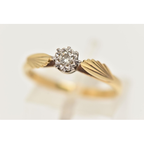 18 - A YELLOW METAL SINGLE STONE RING, a transitional cut diamond, prong set in an a white metal illusion... 