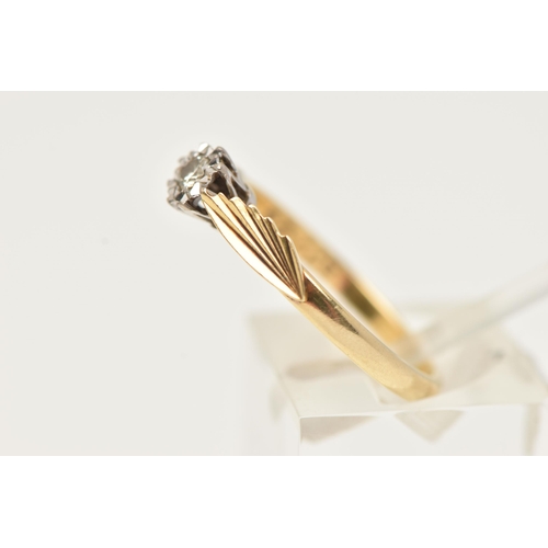 18 - A YELLOW METAL SINGLE STONE RING, a transitional cut diamond, prong set in an a white metal illusion... 