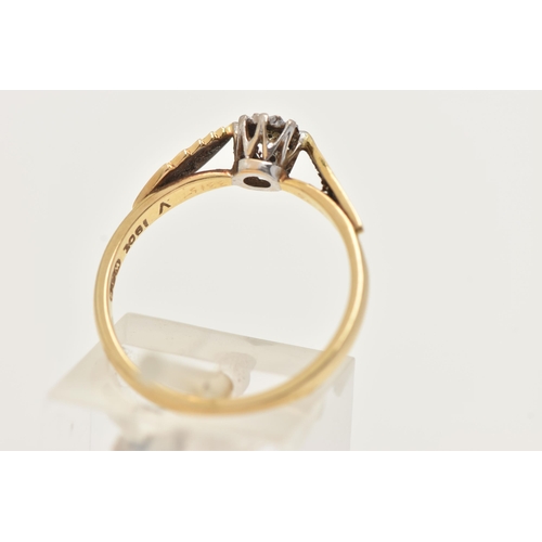 18 - A YELLOW METAL SINGLE STONE RING, a transitional cut diamond, prong set in an a white metal illusion... 