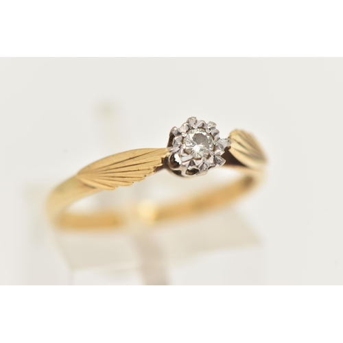 18 - A YELLOW METAL SINGLE STONE RING, a transitional cut diamond, prong set in an a white metal illusion... 