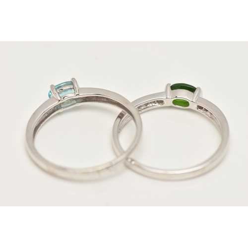 20 - TWO 9CT GOLD GEM SET RINGS, a pair of matching white gold rings, one set with an oval cut blue stone... 