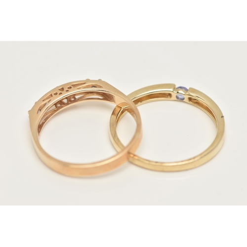 23 - TWO 9CT GOLD GEM SET RINGS, a single stone ring and a six stone band ring, set with circular cut tan... 