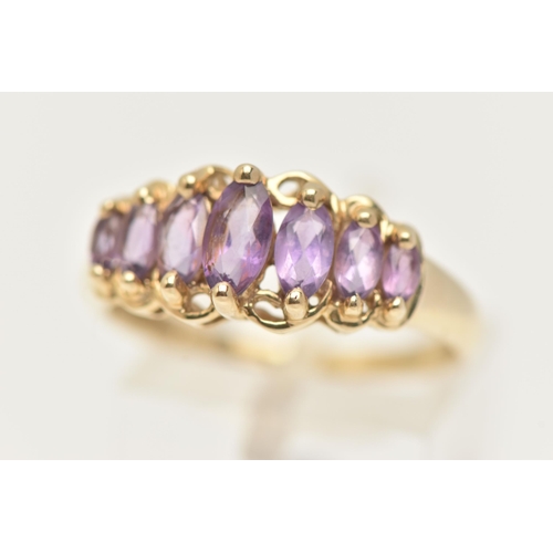 26 - A 9CT GOLD GEM SET RING, seven marquise cut amethysts, prong set in yellow gold, hallmarked 9ct Birm... 