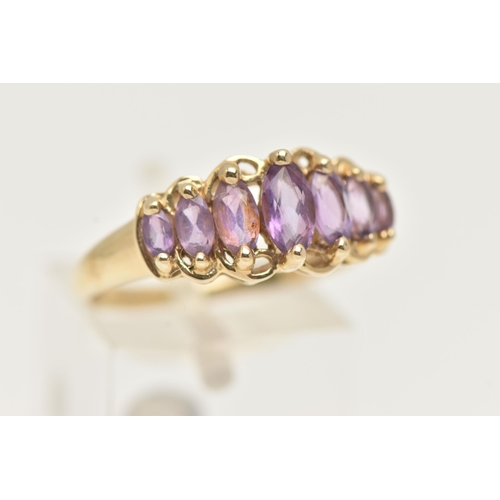 26 - A 9CT GOLD GEM SET RING, seven marquise cut amethysts, prong set in yellow gold, hallmarked 9ct Birm... 