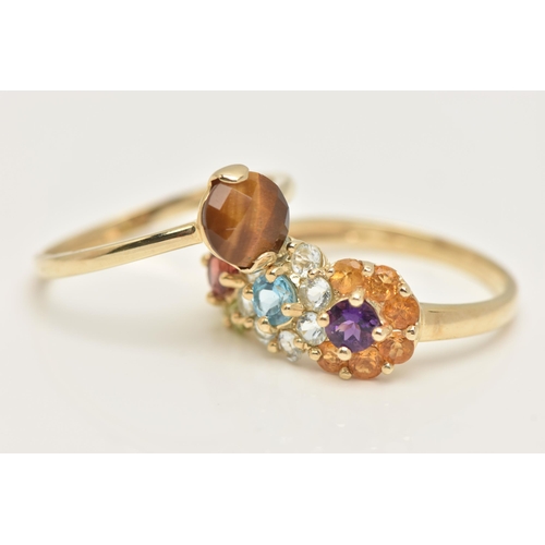 30 - TWO 9CT GOLD GEM SET RINGS, the first a single faceted tigers eye prong set in yellow gold, the seco... 