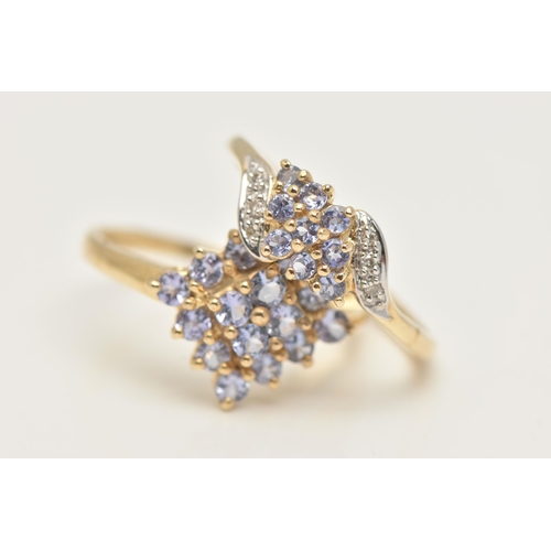 33 - TWO 9CT GOLD GEM SET RINGS, two yellow gold cluster rings, set with circular cut tanzanite stones, h... 