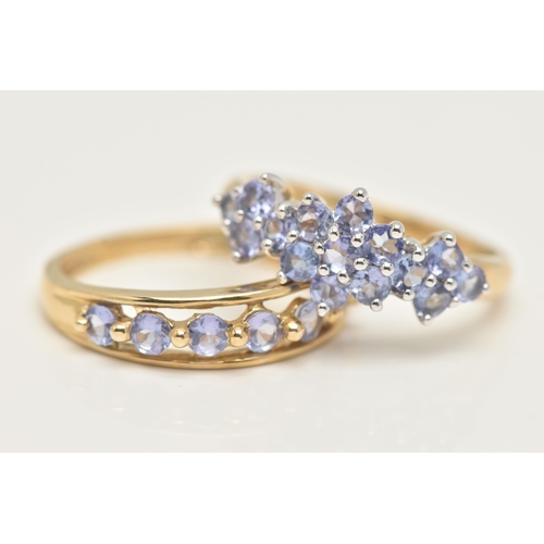 34 - TWO 9CT GOLD GEM SET RINGS, two yellow gold cluster rings, set with circular cut tanzanite stones, h... 