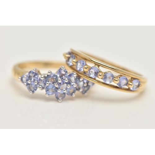 34 - TWO 9CT GOLD GEM SET RINGS, two yellow gold cluster rings, set with circular cut tanzanite stones, h... 