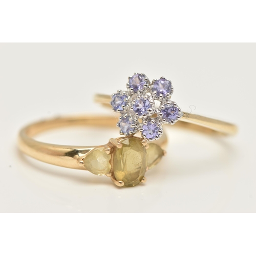 36 - TWO 9CT GOLD GEM SET RINGS, a three stone ring and a floral cluster ring, yellow gold shanks, both h... 