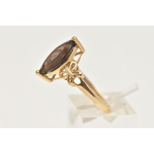 38 - A 9CT GOLD GEM SET RING, a marquise cut smoky quartz, prong set in yellow gold, hallmarked 9ct Birmi... 