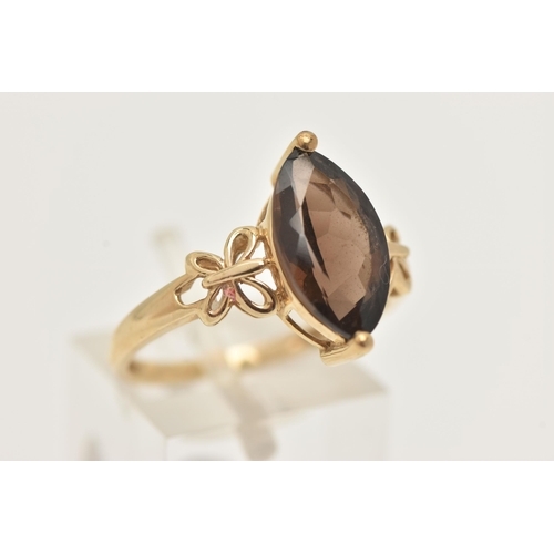 38 - A 9CT GOLD GEM SET RING, a marquise cut smoky quartz, prong set in yellow gold, hallmarked 9ct Birmi... 