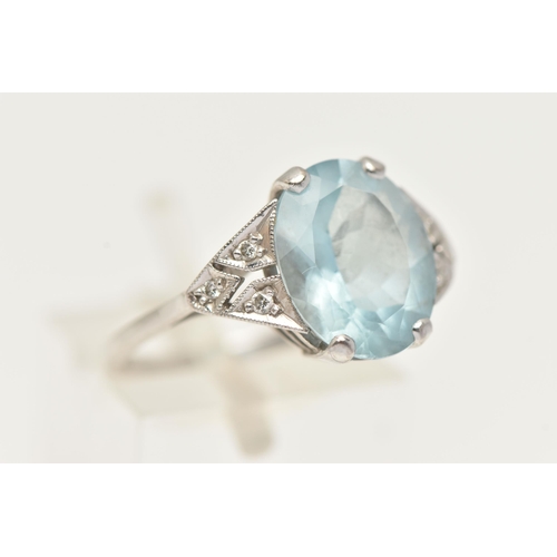 4 - AN 18CT GOLD AQUAMARINE AND DIAMOND RING, an oval cut aquamarine, approximate carat weight 3.80ct, f... 