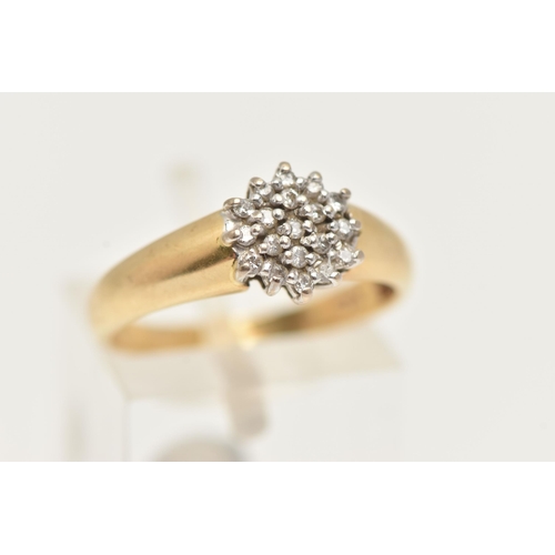 43 - AN 18CT GOLD DIAMOND CLUSTER RING, nineteen round brilliant cut diamonds, prong set, leading on to a... 