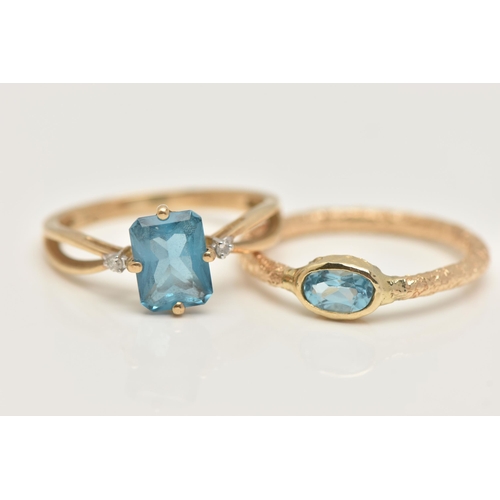 44 - TWO 9CT GOLD GEM SET RINGS, the first a rectangular cut blue topaz, flanked with two round brilliant... 