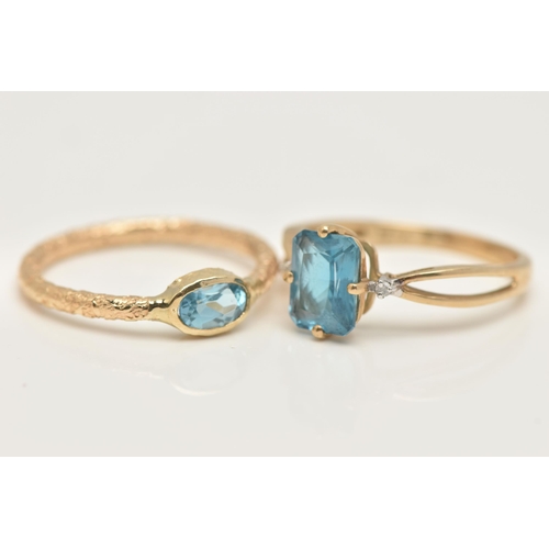 44 - TWO 9CT GOLD GEM SET RINGS, the first a rectangular cut blue topaz, flanked with two round brilliant... 