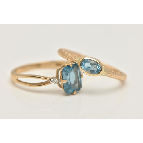 44 - TWO 9CT GOLD GEM SET RINGS, the first a rectangular cut blue topaz, flanked with two round brilliant... 