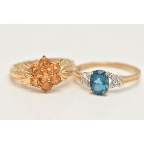 47 - TWO 9CT GOLD GEM SET RINGS, a blue topaz yellow gold ring and a citrine cluster ring in yellow gold,... 