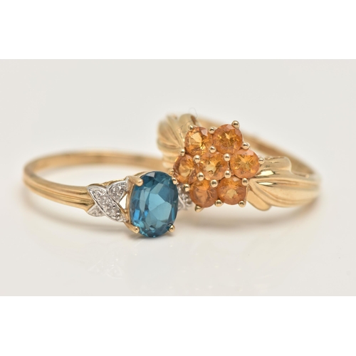 47 - TWO 9CT GOLD GEM SET RINGS, a blue topaz yellow gold ring and a citrine cluster ring in yellow gold,... 