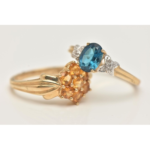 47 - TWO 9CT GOLD GEM SET RINGS, a blue topaz yellow gold ring and a citrine cluster ring in yellow gold,... 