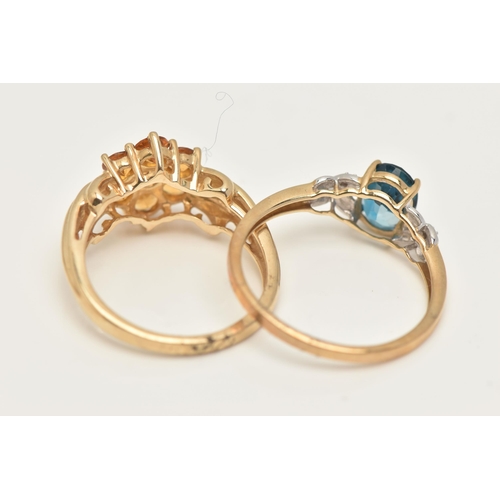 47 - TWO 9CT GOLD GEM SET RINGS, a blue topaz yellow gold ring and a citrine cluster ring in yellow gold,... 