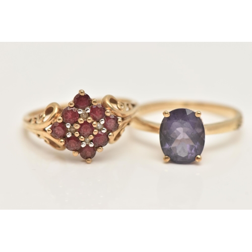 55 - TWO 9CT GOLD GEM SET RINGS, the first a garnet cluster ring with diamond accents, scrolling detail t... 