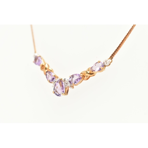 82 - A 9CT GOLD GEM SET NECKLACE, a festoon style necklace, set with five pear cut amethysts and diamond ... 