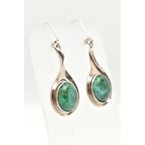 87 - A PAIR OF WHITE METAL GEM SET DROP EARRINGS, each earring designed as a tear drop set with a greenis... 