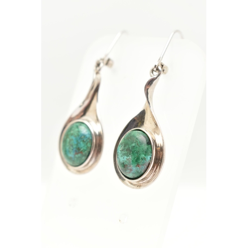 87 - A PAIR OF WHITE METAL GEM SET DROP EARRINGS, each earring designed as a tear drop set with a greenis... 