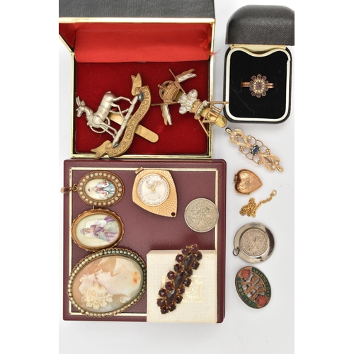 104 - AN ASSORTMENT OF JEWELLERY, to include a yellow metal heart locket, stamped 9ct bk & ft, a 19th cent... 