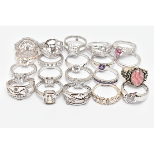 106 - A BAG OF TWENTY WHITE METAL RINGS, of various designs most set with cubic zirconia, one set with a r... 